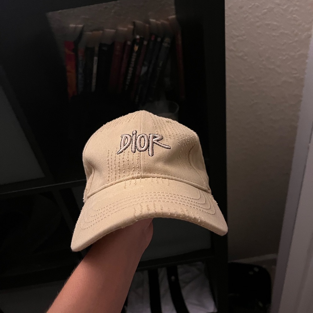 Tan and white Dior hat